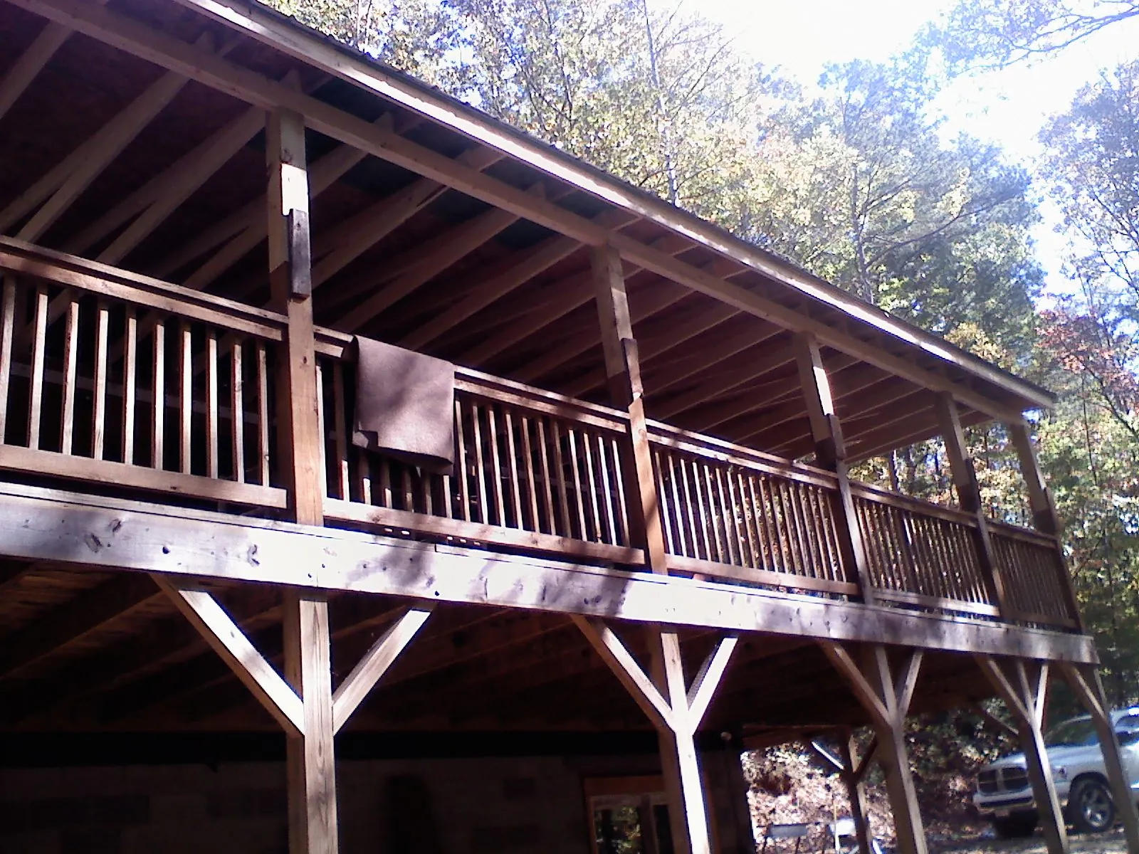 Timber framing under a new elevated porch and deck — Roof Leak Repair in Eaton Rapids by Roofing Brothers